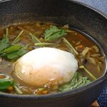 半熟卵入り雑穀のカレー雑炊